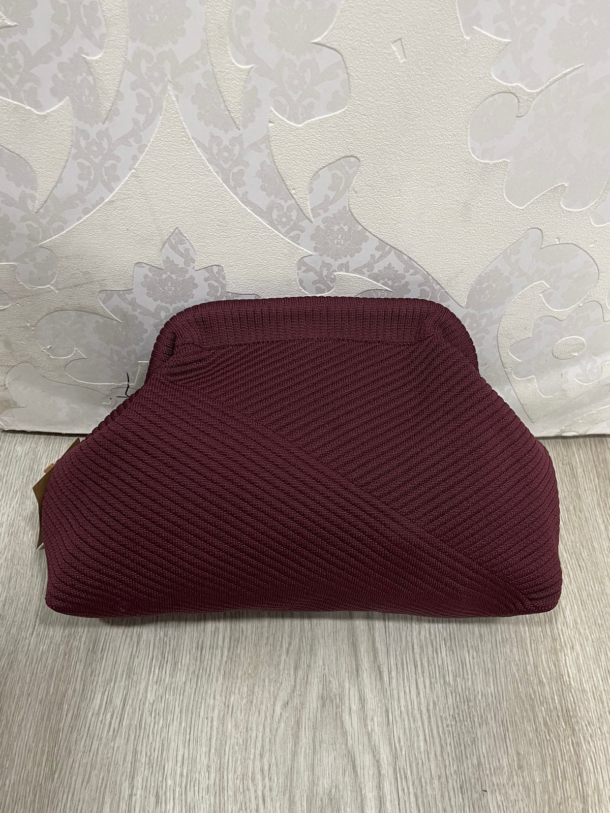 Bolso saquito granate